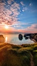 Orange sunset over the Virgin rock on the nuns beach in Ballybunion county Kerry Ireland on the wild Atlantic Way Royalty Free Stock Photo