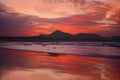 Orange sunset in playa Famara, Lanzarote Royalty Free Stock Photo