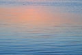 Sunset reflections on the water surface Royalty Free Stock Photo