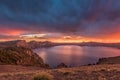 Orange Sunset and Storm Clouds Over Crater Lake Royalty Free Stock Photo