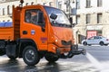 Sweeper for cleaning of streets, watering the sidewalk on the Nevsky Prospekt Royalty Free Stock Photo
