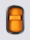 Orange switch with an inscription Royalty Free Stock Photo