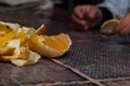 Orange on the table.Child holding a fruit Royalty Free Stock Photo