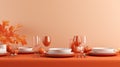 an orange table setting with white dishes and plates Royalty Free Stock Photo