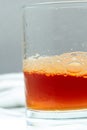 Orange tea bubble whipped in glass