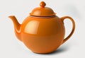 orange teapot with tea on a white background. Royalty Free Stock Photo