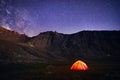 Orange tent glows under night sky Royalty Free Stock Photo