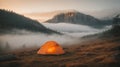 Orange Tent on a Misty Mountain