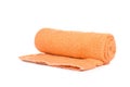 Orange terry towel isolated on a white background. Royalty Free Stock Photo