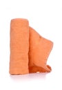 Orange terry towel isolated on white background. Royalty Free Stock Photo