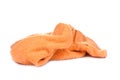 Orange terry towel isolated on a white background. Royalty Free Stock Photo