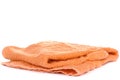 Orange terry towel isolated on a white background. Royalty Free Stock Photo