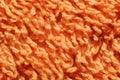 Orange terry towel texture material backdrop macro band background closeup Royalty Free Stock Photo