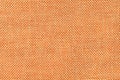 Orange textile background closeup. Structure of the fabric macro Royalty Free Stock Photo