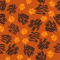 Orange tiger paw print trails and stripes pattern