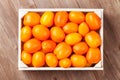 Orange tomatoes box Royalty Free Stock Photo