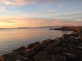 Orange toned sunrise over Galway Bay