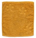 Orange towel isolated on white Royalty Free Stock Photo
