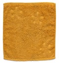Orange towel isolated on white Royalty Free Stock Photo