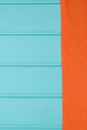 Orange towel over wooden table Royalty Free Stock Photo
