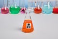 Orange Toxin Vial on Chemical Desk Royalty Free Stock Photo