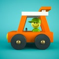 Orange toy car on blue background Royalty Free Stock Photo