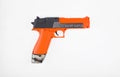 orange toy water gun isolated on white Royalty Free Stock Photo
