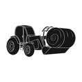 Orange tractor with a ladle transporting hay bale. Agricultural vehicles.Agricultural Machinery single icon in black Royalty Free Stock Photo