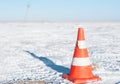 Orange traffic cone used for traffic warning and control. Royalty Free Stock Photo