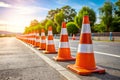 Orange Traffic Cones Lined Up on Roadside Parking Royalty Free Stock Photo