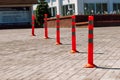 Orange traffic pillar on the road and on parking lane Royalty Free Stock Photo