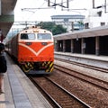 Orange train on forest railway in Alishan Royalty Free Stock Photo