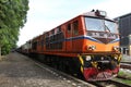 Orange train on railway station waiting