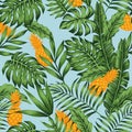 Orange pineapple green jungle blue background seamless