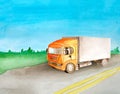 A orange truck with a grey body carries cargo on an asphalt road past the meadow and woods on the horizon in summer and a clear