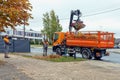 orange truck Iveco skibicki with loader Royalty Free Stock Photo