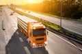 Orange truck in motion blur on the highway Royalty Free Stock Photo