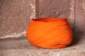 An orange Turban laying on the streets