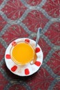 Orange Turkish tea in traditional glass