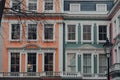 Orange, turquoise and pink pastel houses in Primrose Hill, London, UK