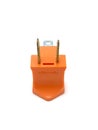 Orange two prong electrical plug Royalty Free Stock Photo