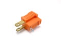 Orange two prong electrical plug Royalty Free Stock Photo