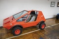 An orange 1977 Urba Car at Lane Motor Museum with the largest collection of vintage European cars, motorcycles and bicycles Royalty Free Stock Photo