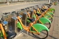 Orange urban public transport bicycle Royalty Free Stock Photo