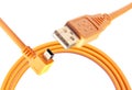 Orange USB cable isolated on white background Royalty Free Stock Photo