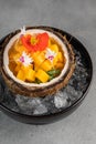 Orange vegetables and fruit with chia seeds and mango, ingredients on dark concrete background Royalty Free Stock Photo