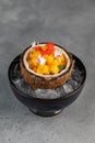 Orange vegetables and fruit with chia seeds and mango, ingredients on dark concrete background Royalty Free Stock Photo