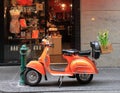 Orange Vespa motorbike