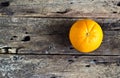 Orange vibrant on wooden table, vibrant concept