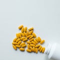 Orange vitamin pills background Royalty Free Stock Photo